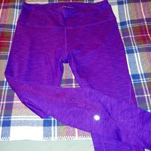 Purple leggings.